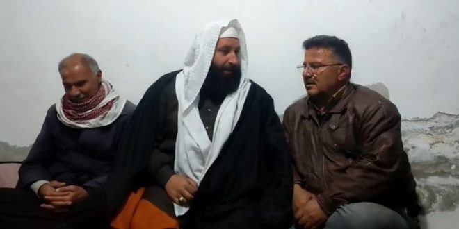 The photo was taken from a video circulating on social media about two Yazidi men who converted to Islam