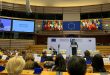 Photo of STJ during the opening speech of the Seventh Brussels Conference 2023.