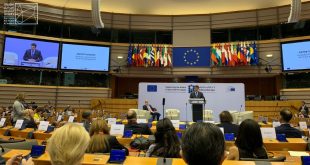 Photo of STJ during the opening speech of the Seventh Brussels Conference 2023.